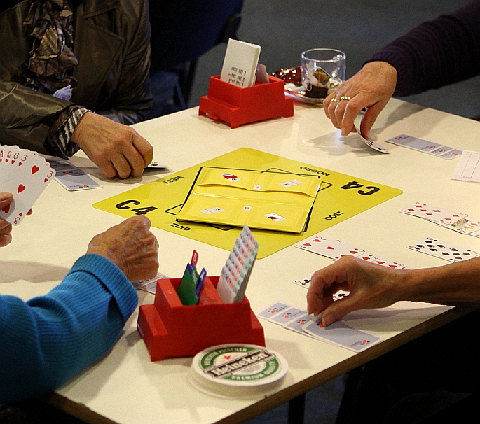 bieden, laten, passen, winnen